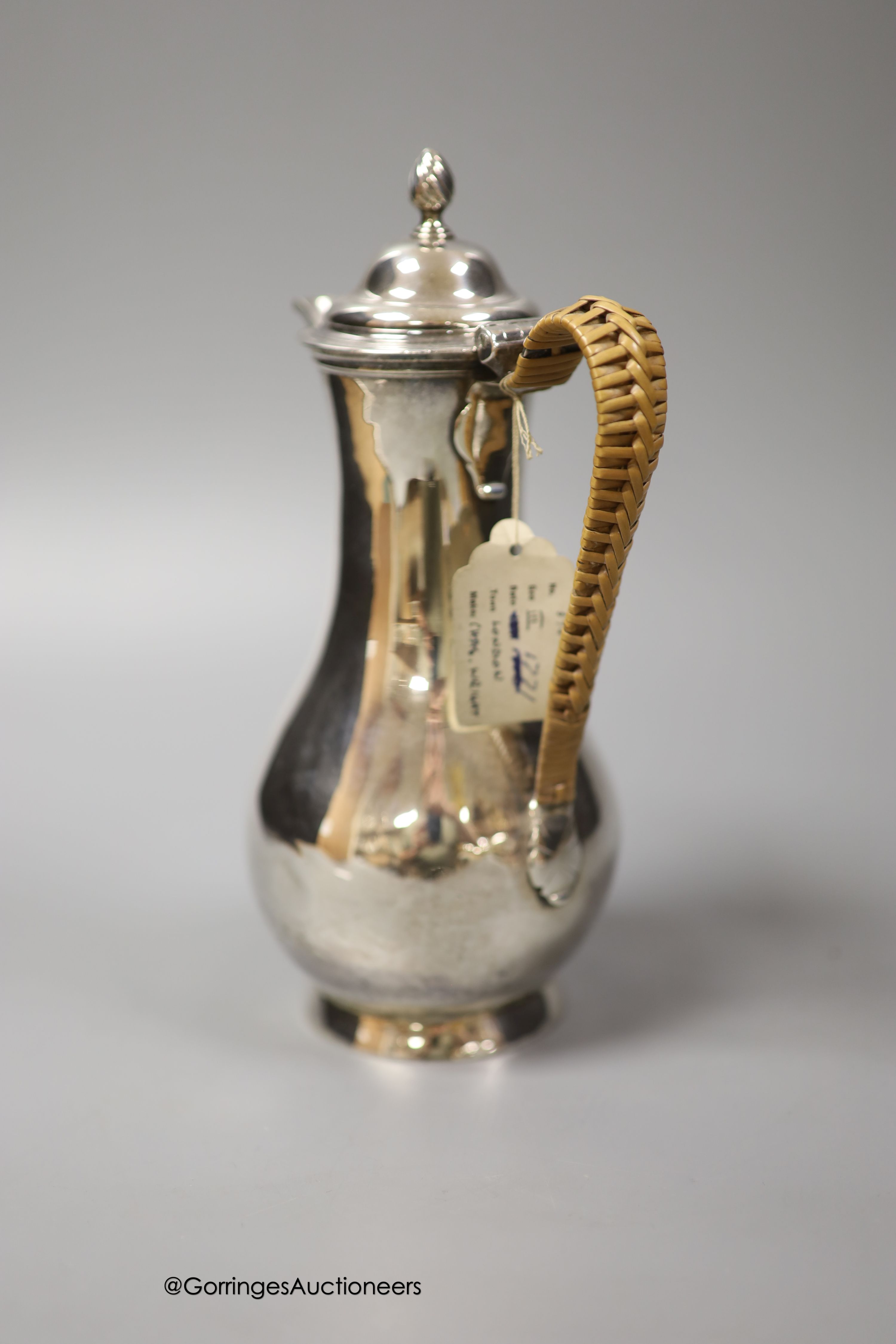 A George III silver baluster hot water pot, Charles Wright, London, 1771, height 21.7cm, gross weight 11.5oz